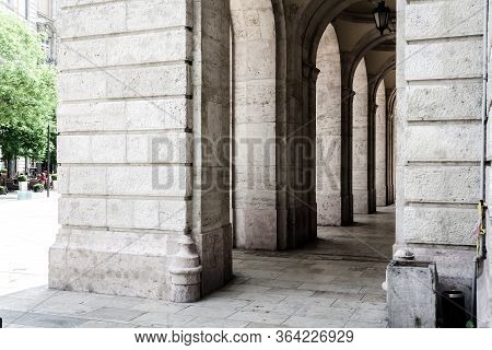 Budapest, Hungary. . Historic Building, Facade With Columns And Arched Windows.