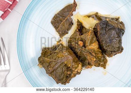 Minced Meat Rolls In Chard Served On The Plate. Traditional Balkan Meal Made With Chard And Minced M
