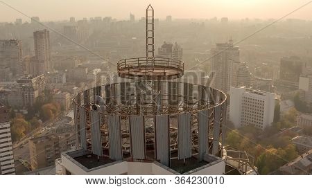 Silhouette Of A Roof Spire. Sunset And Evening City Center