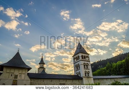 Putna, Suceava Romania - 07.15.2011 Front View Of A Putna Monastery From Bucovina With A Special Arc