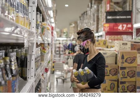 Bangkok, Thailand - May 02: Unnamed Woman Shops In Makro Wholesale Market Wearing Mask And Goggle Du