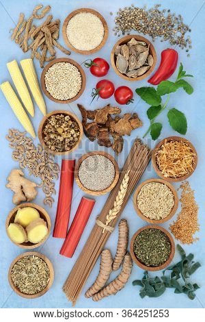 Health food to ease irritable bowel syndrome. Healthy foods to boost immune system high in antioxidants, protein, dietary fiber, vitamins, minerals, omega 3, smart carbs & anthocyanins. Flat lay.
