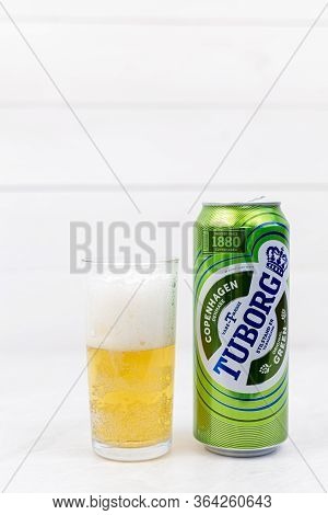 Belgrade, Serbia - 27. April 2020.: Tuborg Beer Can With Glass Of Beer On The Table With Copy Space