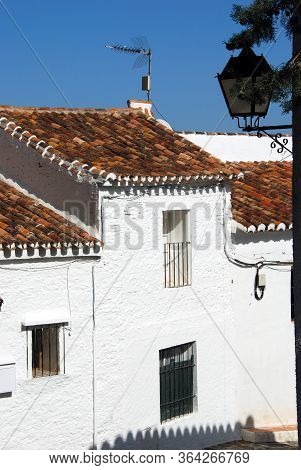 Townhouses Along A Village Street, Macharaviaya, Costa Del Sol, Malaga Province, Andalucia, Spain.