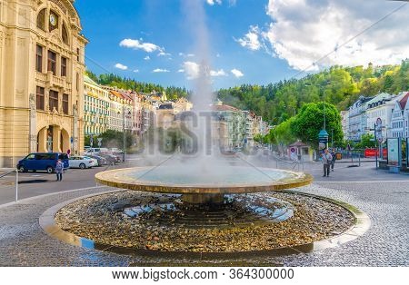 Karlovy Vary, Czech Republic, May 10, 2019: Hot Spring Geyser Vridlo At Carlsbad Historical City Cen