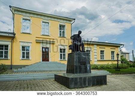 Alapayevsk, Russia - June 15, 2017: View Of The Tchaikovsky House-museum With A Monument To The Grea