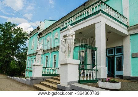 Alapayevsk, Russia - June 15, 2017: View Of The Holy Trinity Orthodox Cathedral  From The Bridge Ove