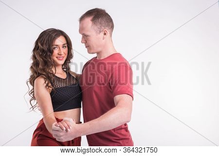 Beauty Couple Dancing Social Dance. Kizomba Or Bachata Or Semba Or Taraxia , On White Background. So