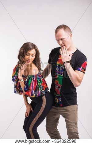 Funny Couple Dancing Social Dance. Kizomba Or Bachata Or Semba Or Taraxia , On White Background. Soc
