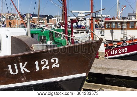 Urk, Netherlands - April 22, 2020: Tradiotional Fishing Ships In The Harbor Of Urk, Netherlands