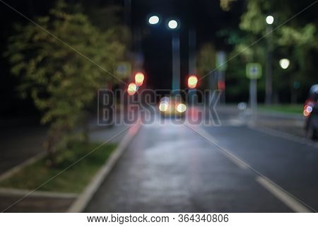 Blurred Empty Night Street, Taxi Standing By Traffic Lights, Defocused Picture