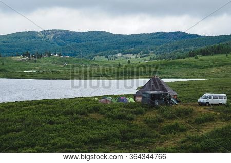 Ail Traditional Altaic Houses And Tourist Tents Around On The Lake Shore In Ulagansky District Of Th
