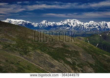 Spectacular View From The Top Of The Mountain To The Mountain Range In The Ulagansky District Of The