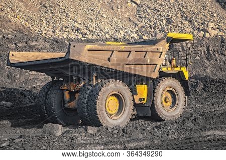 Big Yellow Mining Truck Laden Anthracite Moves Open Pit Coal Mine