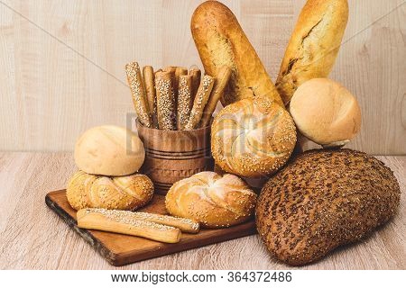 Сrisp Bread With Buns. French Baguettes. Fresh Crispbread. Bread Background. Different Breed  On Woo