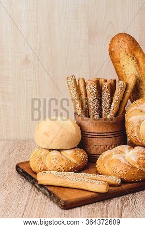 Сrisp Bread With Buns. French Baguettes. Fresh Crispbread. Bread Background. Different Breed  On Woo