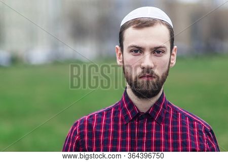 Portrait Of Religious Young Jewish Guy In Traditional Jewish Male Headdress, Hat, Boom, Or Yiddish O