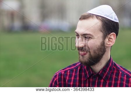 Portrait Of Religious Happy Positive Jewish Guy In Traditional Male Headdress, Hat, Boom, Or Yiddish