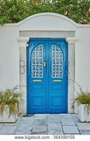 Pink Bougainvillea Flowers And Old Blue Door At Bodrum. Mugla, Turkey