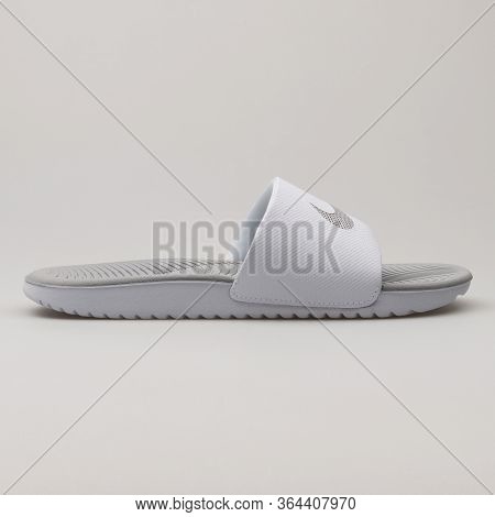 Vienna, Austria - February 19, 2018: Nike Kawa Slide White Sandal On White Background.