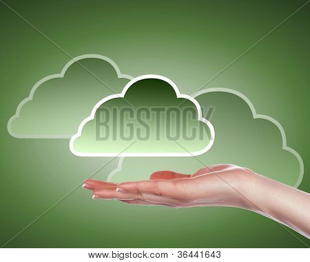 Hand med cloud computing symbol mot färg bakgrund