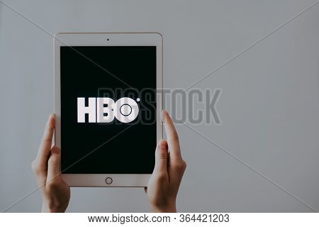 Home Box Office, Hands Holding Ipad With Screen Of Hbo Logo