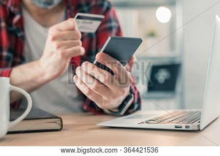 Freelancer Shopping Online With Smartphone App And Credit Card From Small Business Home Office, Sele