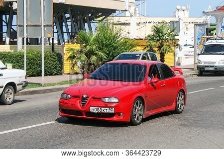 Sochi, Russia - July 19, 2009: Red Compact Executive Car Alfa Romeo 156 In The City Street.