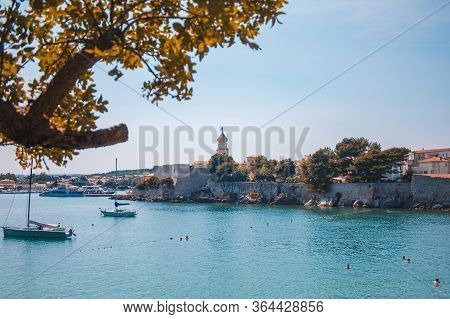 Krk Island, Croatia - July 19 2018: Picturesque Coastline In Krk Town On The Island Krk. People Are 