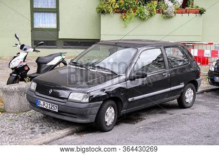 Berlin, Germany - September 10, 2013: Black Hatchback Renault Clio In The City Street.