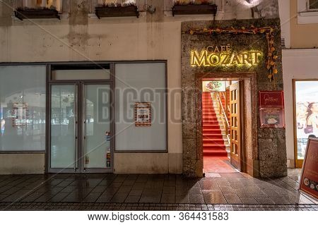 Feb 3, 2020 - Salzburg, Austria: Cafe Mozart Entrance In The Evening