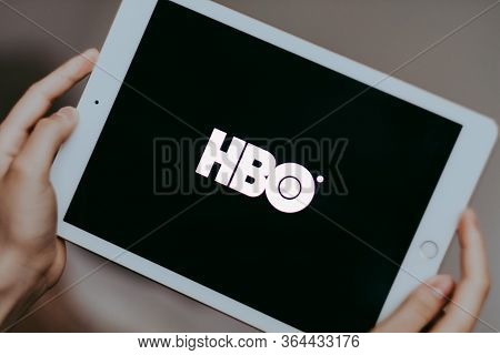 Home Box Office, Hands Holding Ipad With Screen Of Hbo Logo