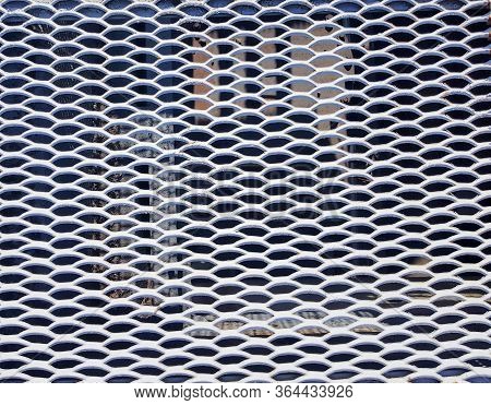 White metal staircase grid background. Metal mesh texture