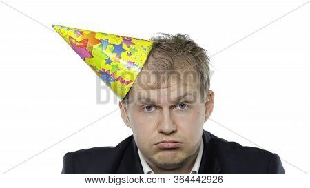 Portrait Of Drank Sleepy Young Clerk Man With A Hangover Looking At Camera. Emotions. Disheveled Guy