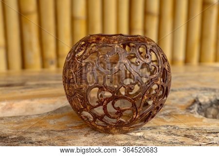 Coconut Shell Carving. Handicraft Of Indigenous People In Bali, Indonesia. Shelve With Balinese Souv