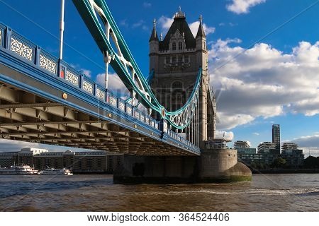 Tower Bridge In London In A Beautiful Summer Day, England, United Kingdom It Is A Combined Bascule A