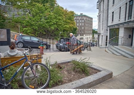 Quebec, Canada September 23, 2018: Street Musician On The Historic Street Of Quebec City, The Rue Pe