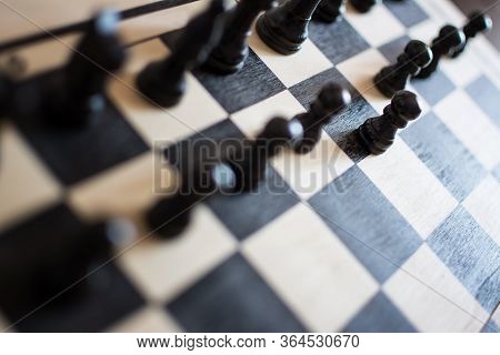 Chess Pieces On The Chess Board With Selective Focus And Crop Fragment. Business And Motivation Conc