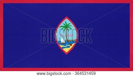 Guam National Fabric Flag, Textile Background. Symbol Of Unincorporated Territory Of The United Stat