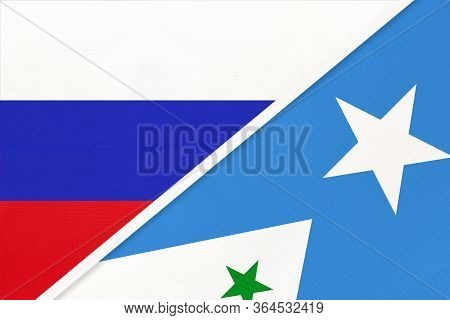 Russia Or Russian Federation Vs Galmudug State, Symbol Of Two National Flags From Textile. Relations
