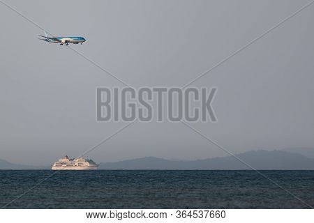 Phu Quoc, Vietnam - December 24: Aircraft Landing And Cruise Ship Arriving On December 24, 2019 To P