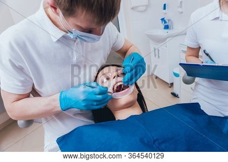 Dental Treatment With Expander. Modern Dental Technology