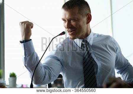 Portrait Of Confident Man In Presentable Suit Public Speaking With Strong Speech. Businessman Showin