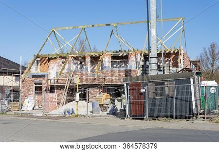 Sint Gillis Waas, Belgium, April 4, 2020, House Under Construction With An Iron Gate In Front