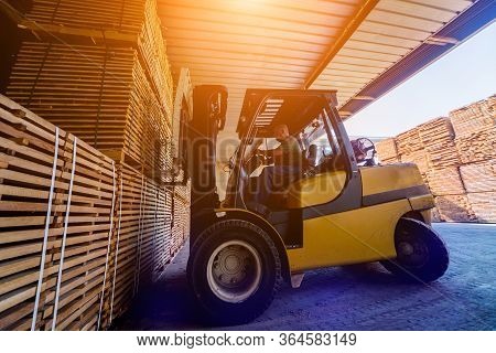 Forklift Loader Load Lumber Into A Dry Kiln. Wood Drying In Containers.