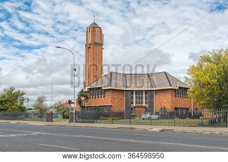 Harrismith, South Africa - March 16, 2020:  A Street Scene, With The Dutch Reformed Church Kerkenber