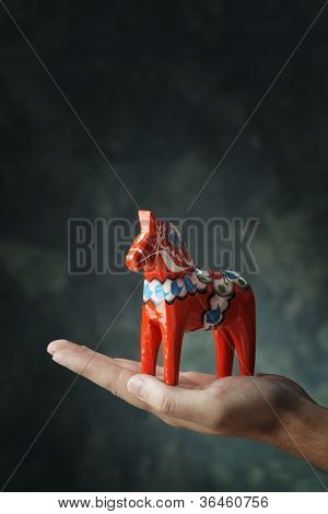 A Dalecarlian horse or Dala horse (Swedish: DalahÃ?Ã?Ã?ÃÂ¤st) is a traditional carved and painted wooden statuette, it has become a symbol of Dalarna as well as Sweden in general.