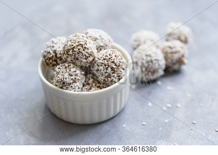 Healthy Raw Energy Balls With Cocoa, Coconut, Sesame, Chia On White Background.
