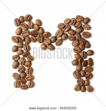 Letter M Arranged From Coffee Beans Isolated On The White Background