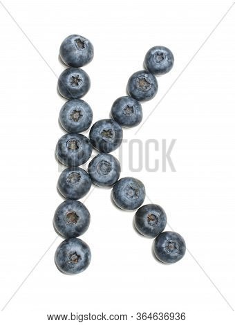 Alphabet Letter K Arranged From Northern Highbush Blueberry Isolated